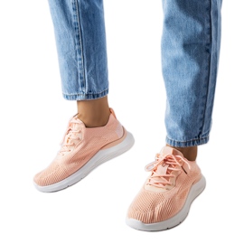 Orange and white sneakers from Nelson
