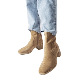 Beige ankle boots with a perforated upper from Cavallo