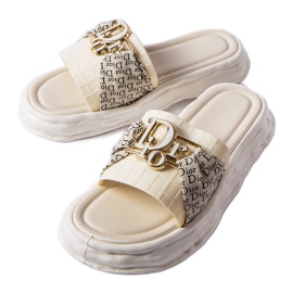 Beige rubber decorative slides from Bérard Beige rubber decorative slides from Bérard