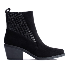 Black stylish women's boots on the Shelovet post