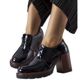 Black patent shoes with a high heel from Vinceza