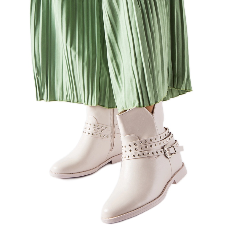 Beige ankle boots with an Anchorage covered wedge