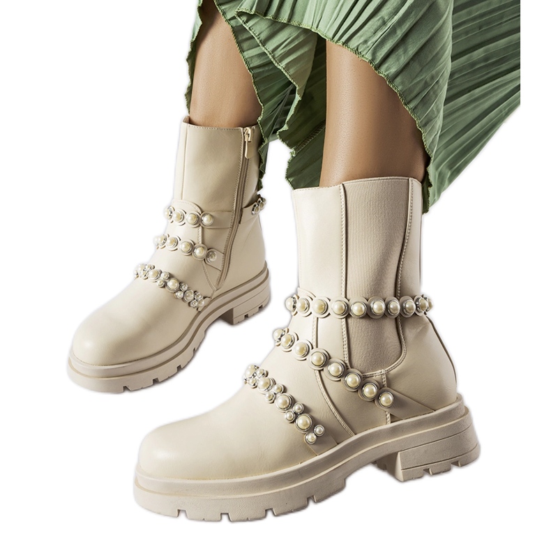 Beige ankle boots decorated with Callicratide pearls Beige ankle boots decorated with Callicratide pearls