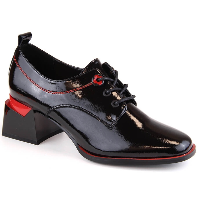 Black patent leather women's shoes on a block by Filippo