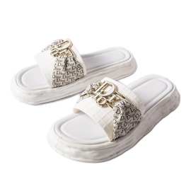 Inna Bérard white decorative rubber flip-flops