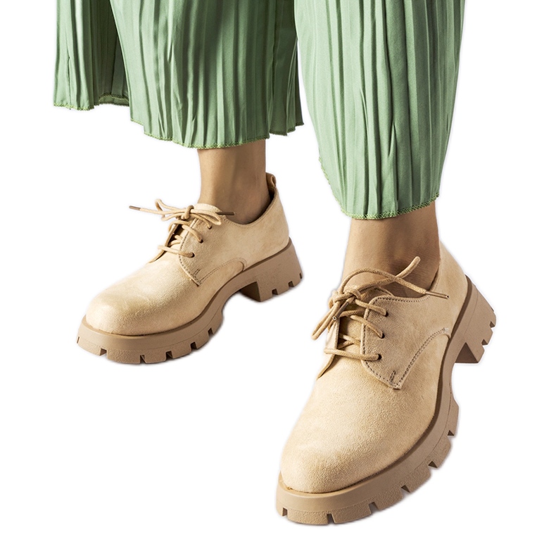 Beige shoes with a massive sole from Coleman