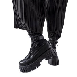 Black sock boots with a Colce tread