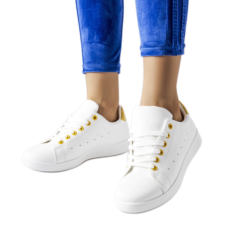 Bushnell white sneakers with yellow accents