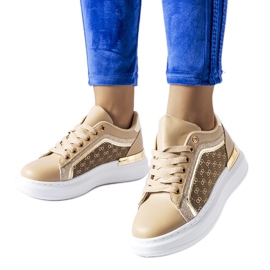 Beige shoes decorated with glitter on the Leo platform