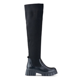 Black over-the-knee boots with an elastic upper