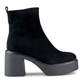 Black women's ankle boots made of natural leather with a high heel platform