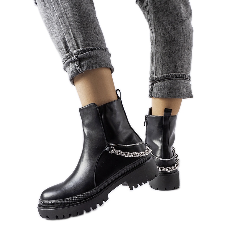 Black ankle boots with Muqaddim chain
