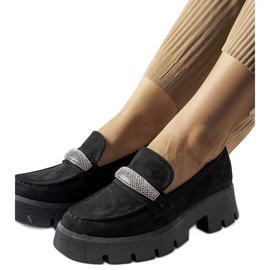 Black moccasins with a massive Macario sole