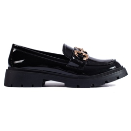 Patent black loafers with a gold Shelovet buckle