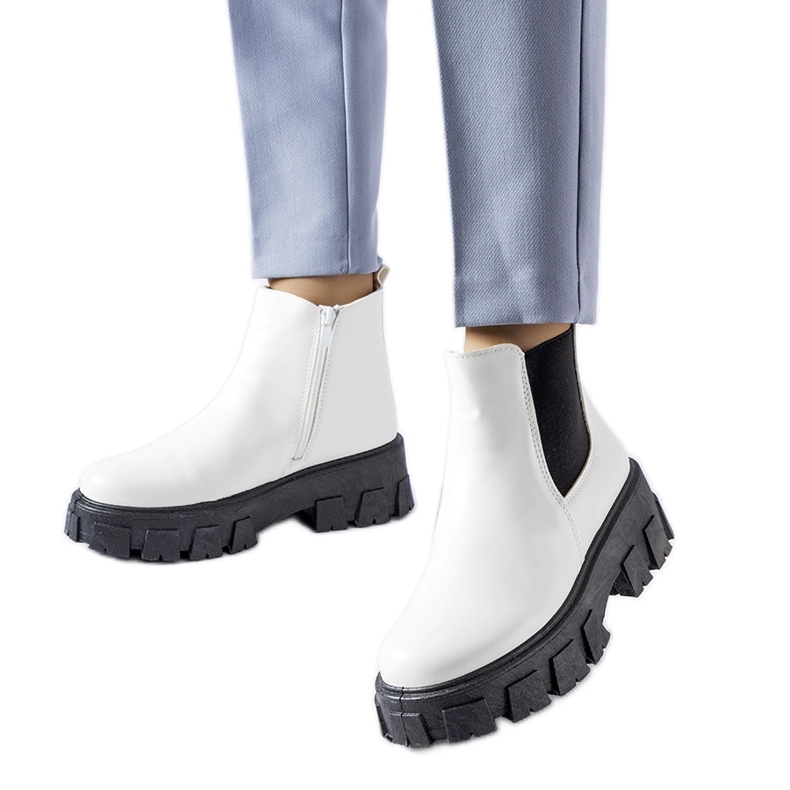Massive white and black Petronio ankle boots