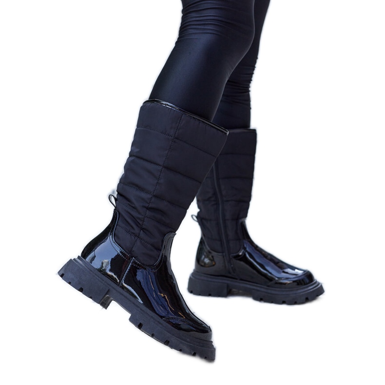Black insulated patent boots from Villafranca