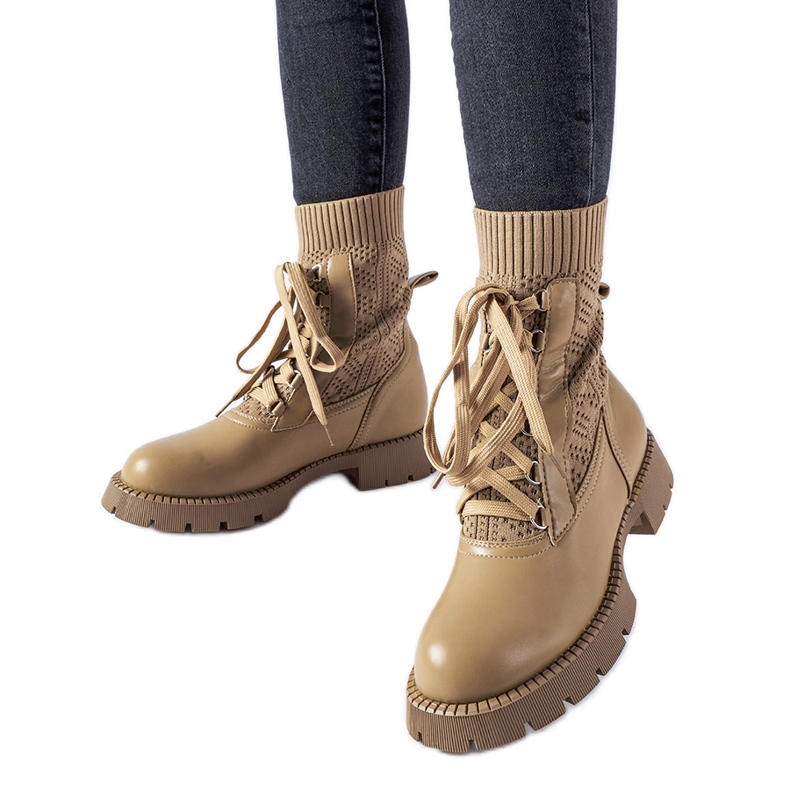 Beige openwork sock boots by Portico