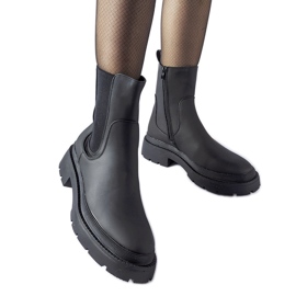 Black massive insulated ankle boots by Banaudon