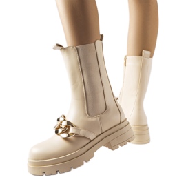 Beige ankle boots with a chain from Thierry