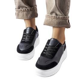 Black sneakers on a thick Seluci platform Black sneakers on a thick Seluci platform