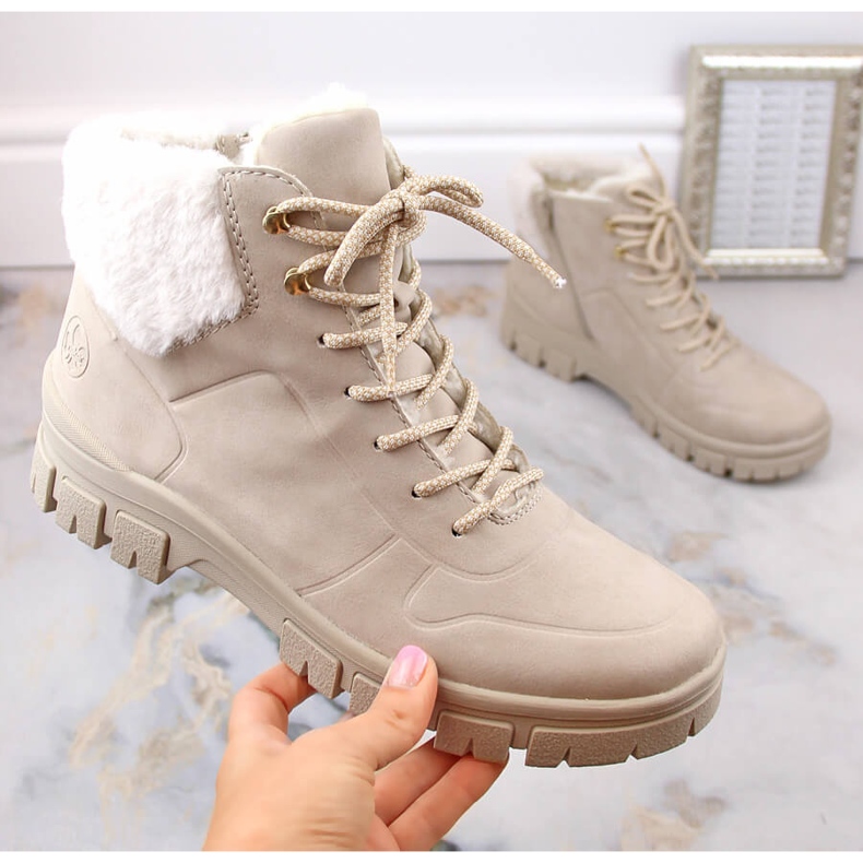 Comfortable, insulated, beige women's ankle boots by Rieker Comfortable, insulated, beige women's ankle boots by Rieker