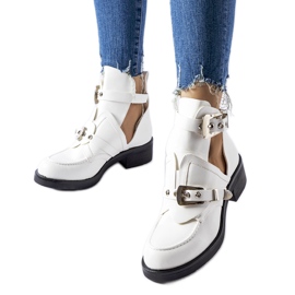 White ankle boots with cutouts from Sperone