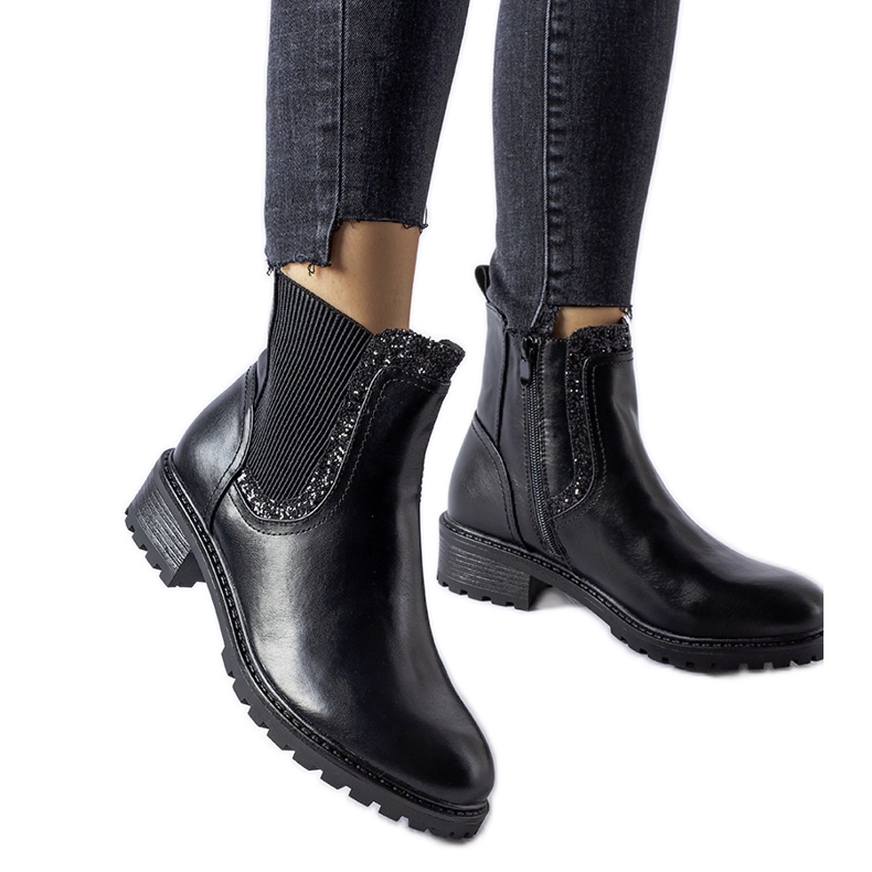 Black ankle boots decorated with Emidio glitter