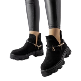 Black cut-out ankle boots with an Accettura bracelet Black cut-out ankle boots with an Accettura bracelet