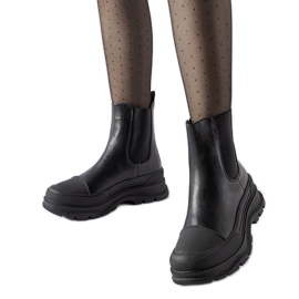 Black ankle boots with a sporty Ermanno sole
