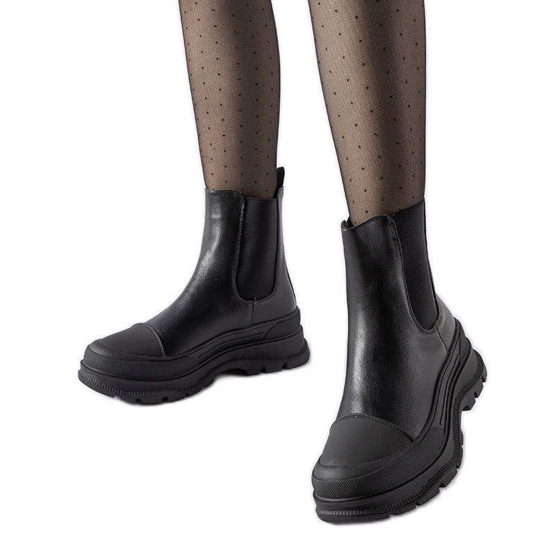 Black ankle boots with a sporty Ermanno sole