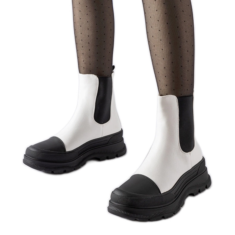 White ankle boots with a sporty Ermanno sole