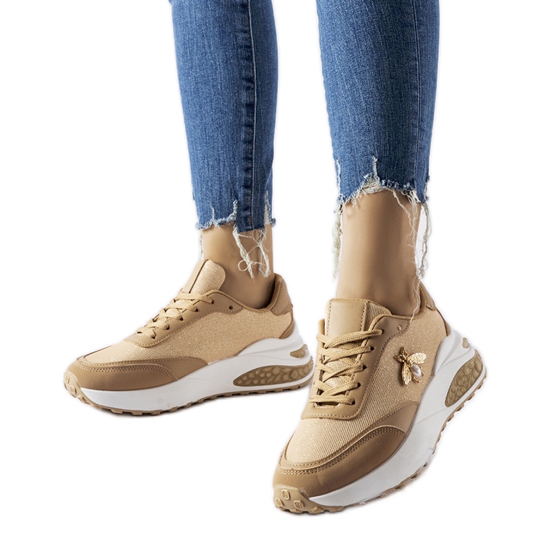 Brown and white sneakers with decorative Acciano thread Brown and white sneakers with decorative Acciano thread