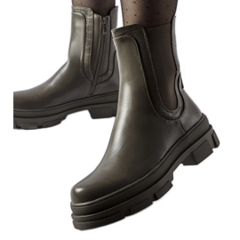 Green sneakers with a massive Torin sole Green sneakers with a massive Torin sole