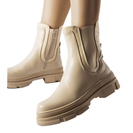 Beige sneakers with a massive Torin sole green Beige sneakers with a massive Torin sole green