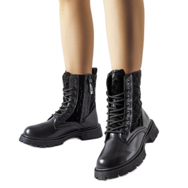 Black boots decorated with Jalbert quilting