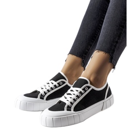 Black sneakers on a thick Egidio platform