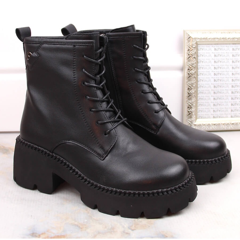 Women's leather boots on a high heel and platform, insulated, black, T.Sokolski 191