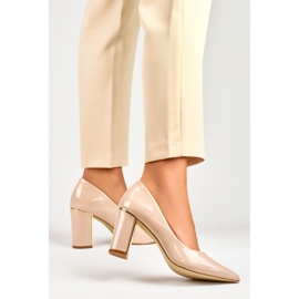 Bright patent leather pumps for women with a comfortable high heel beige