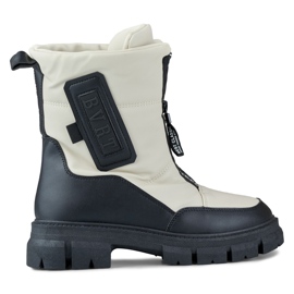 Women's beige snow boots with a black sole