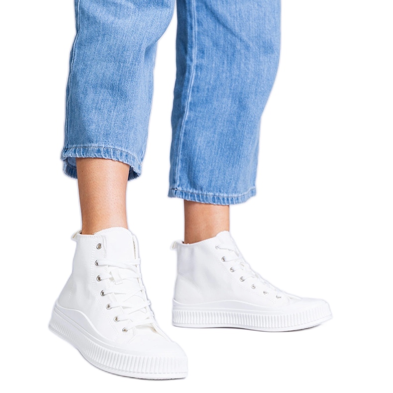 White high platform sneakers by Guerrino