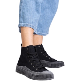 Black high platform sneakers by Guerrino