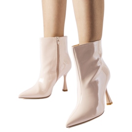 Beige patent leather ankle boots from Dionisi