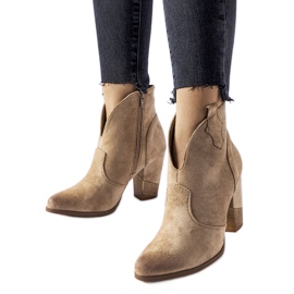 Beige cut-out insulated cowboy boots by Brunilde