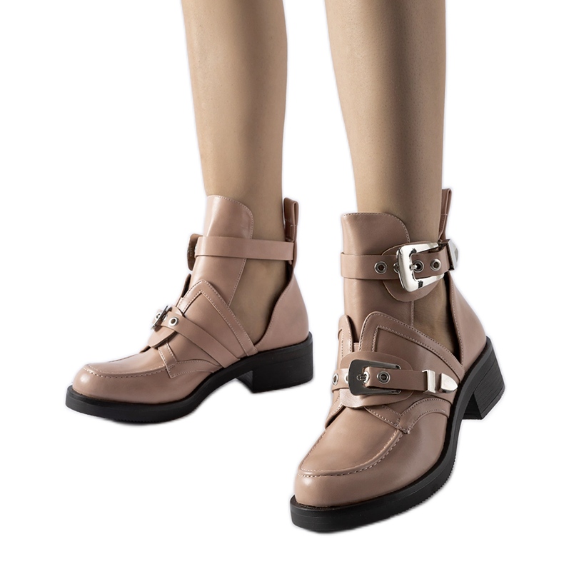 Pink ankle boots with cutouts from Sperone