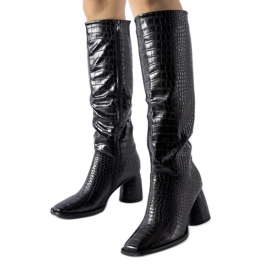 Black boots decorated with Council embossing