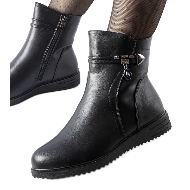 Black insulated ankle boots with a decorative Nola pendant Black insulated ankle boots with a decorative Nola pendant