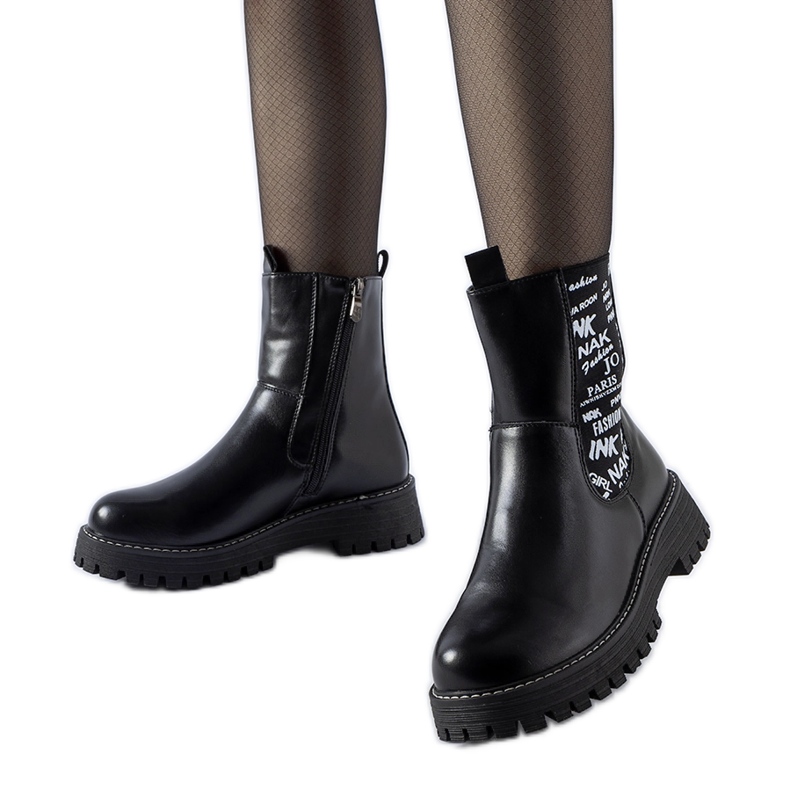 Black insulated ankle boots with inscriptions