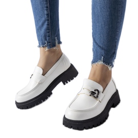 White and black moccasins with a buckle White and black moccasins with a buckle