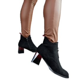 Black ankle boots with a patent heel Black ankle boots with a patent heel
