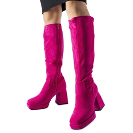 Pink warm boots on a massive Fantino heel